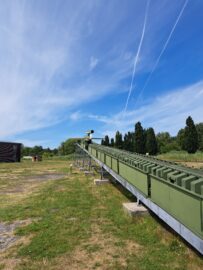 A Fi 103 Flying Bomb prototype mounted on the remains of its launch rail.
